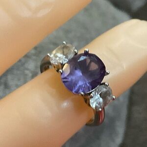 Swarovski: SW 925 CZ sterling silver ring and amethyst cubic zirconia gemstones.